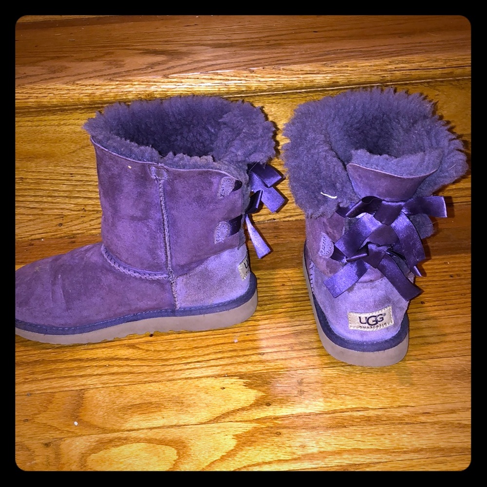purple uggs with two bows on each back